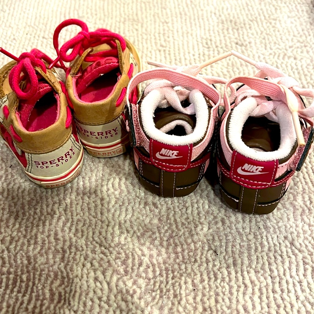 2 pairs of baby girl shoes.